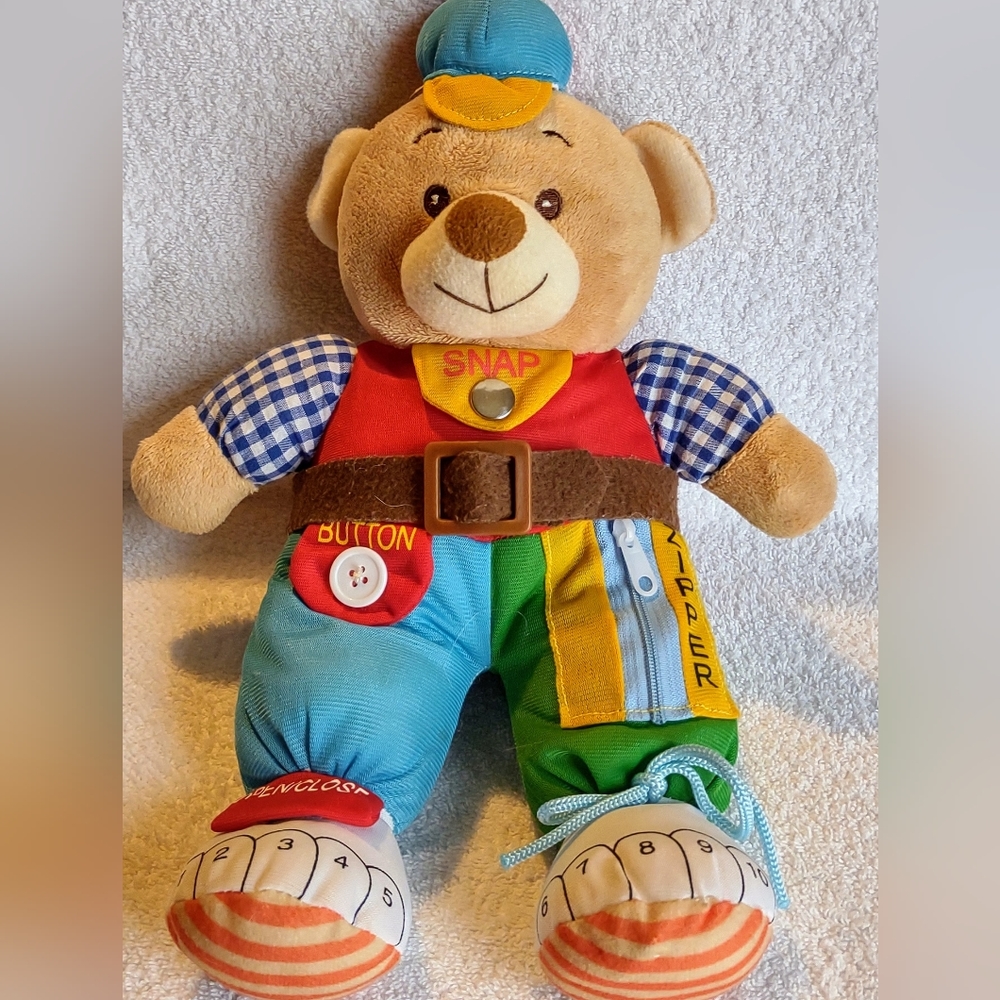Gabi Toy Bear Teach Me To Dress Plush. Snap, Zipper, Button, Open/Close, Tie